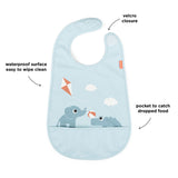 Done By Deer bib w/velcro playground, blue