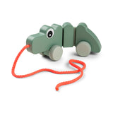 Done By Deer pull along wiggle toy croco, green