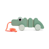 Done By Deer pull along wiggle toy croco, green