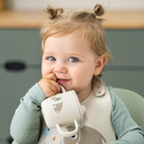 Done By Deer celebration silikonska šolja sa dve ručke, bež