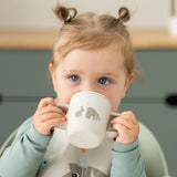 Done By Deer celebration silikonska šolja sa dve ručke, bež